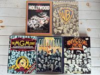 All five illustrated studio history books laid out