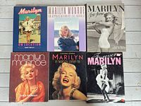 Front covers of all six Marilyn Monroe books