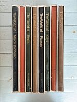 Seven slip-cased volumes including Marcel Duchamp through Bruegel titles