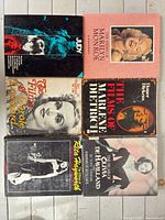 Front covers of all six books laid out