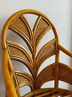 close-up of rattan leaf motif backrest