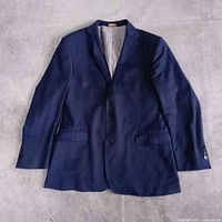 Front view of blue wool blazer laid flat