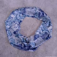 Entire scarf arranged in a loop showing overall size and pattern