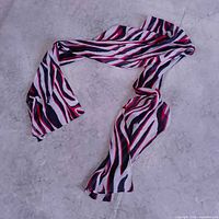 Full view of scarf laid out showing length and pattern