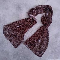 Scarf knotted to show overall length and drape