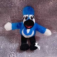 Full view of BJ Birdy plush standing upright