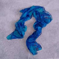 Scarf loosely arranged to display overall look and color gradient