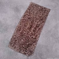 Scarf laid flat showing full pattern and size