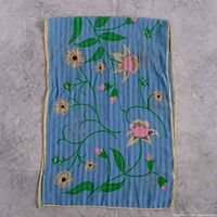 Full view of rectangular blue floral scarf