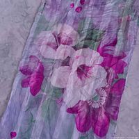 Section of scarf showing floral pattern and crinkled silk texture
