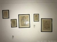 Five original vintage pencil drawings framed in black with off-white mats, displayed on a wall. Various human figure sketches, sizes from about 9x10 to 17x14 inches.