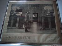 Full framed poster showing image, text, silver frame