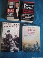 All four books laid out