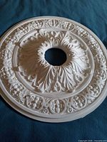 Full view of circular plaster medallion