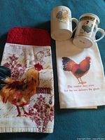 Overview of both towels and both mugs