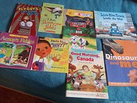 All ten books laid out on a surface