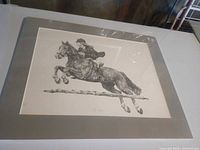 Full view of matted print under plastic