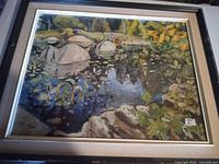 Front view of framed pond landscape print