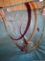 Full view of vase showing swirl pattern and rim