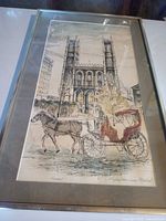 Full view of framed signed print under glass