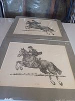 Both prints side by side showing artwork and mats