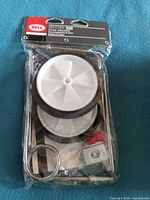 Front of sealed package showing wheels and hardware