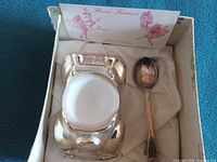 Boxed car-shaped silver plated sugar bowl with white ceramic insert and spoon