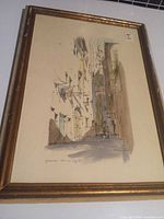 Full view of framed watercolor showing artwork, mat and frame