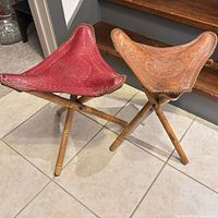 Both stools standing side by side showing color difference and overall form