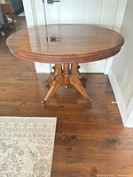Full view of oval dining table top and base