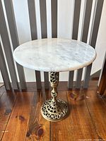 Top view showing round white/gray marble surface