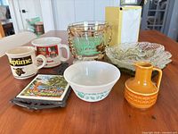 Group shot showing all ten vintage kitchenware items