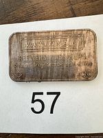 Front view showing branding, weight, purity and serial number