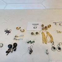 All 15 pairs laid out on countertop