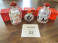 Three snuff bottles and three boxes overview