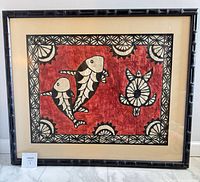 Front view of framed batik artwork showing design and overall condition