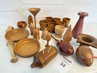 Group view of all turned wood pieces on counter