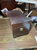 Closed wooden box showing full exterior