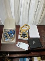 Group shot of all jewelry pieces in boxes