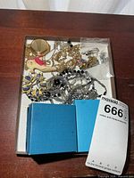 Tray view showing mixed jewelry pieces