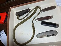 Overview showing all five folding pocket tools in tray