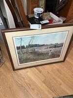 Front view of framed print showing image and frame