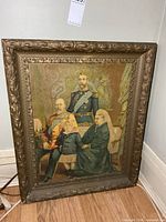 Full view of framed royal family portrait