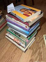 Stack of self-help books showing titles and condition