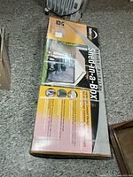 Unopened retail box showing ShelterLogic branding and product information