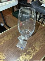 Full view of vase and perfume bottle