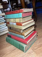 Full stack of nine vintage hardcover books