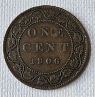 Reverse side showing ONE CENT 1906 within maple leaf wreath