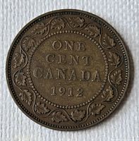 Reverse side showing date 1912 and maple leaf wreath