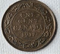 Reverse showing ONE CENT CANADA 1917 within maple leaf wreath